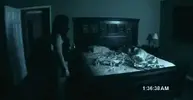 paranormal-activity-standing-by-bed1.webp