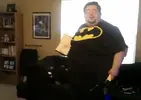 Batman-destroys-Xbox-360-in-the-name-of-rage.webp